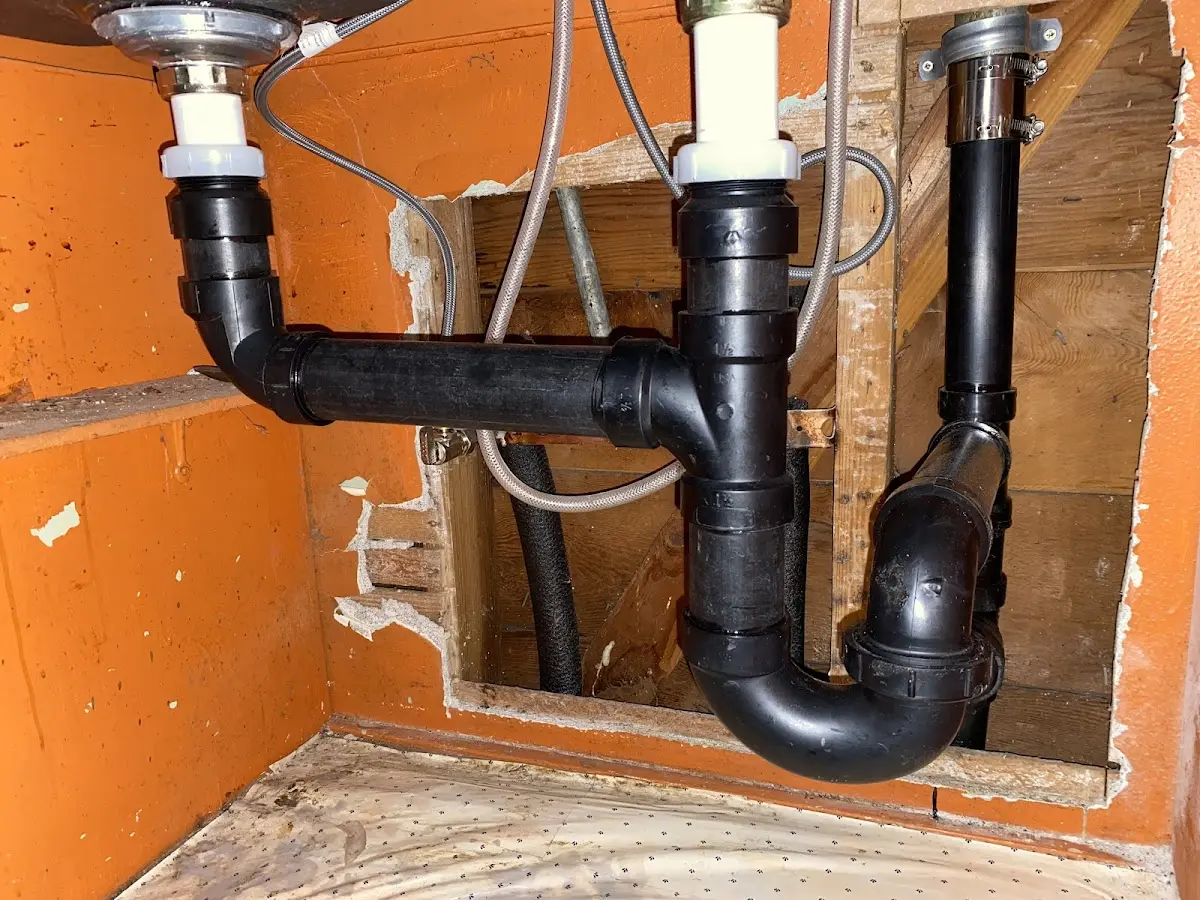 Professional Garbage Disposal Repair equipment and tools on the job in Laconia